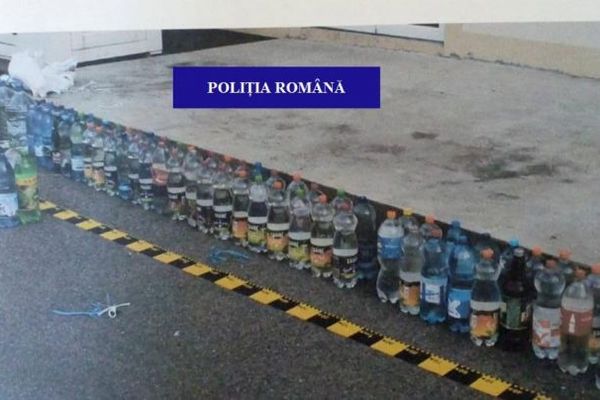 Sălăjeancă, prinsă cu sute de litri de pălincă în portbagaj