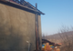 Acoperișul unei case din localitatea Panic, distrus de flăcări